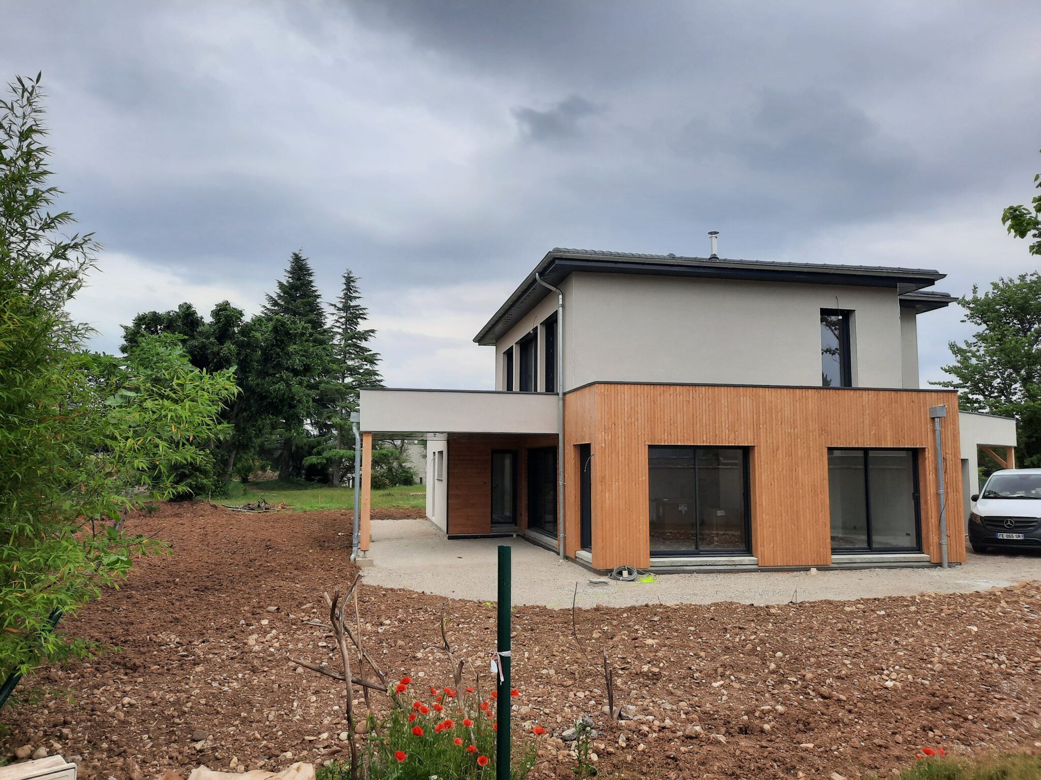Loire Rhône Ossature bois construction Charpentier couvreur artisan Menuiseries PVC ALU Bois ossature bois maison individuelle extension surélévation rénovation zinguerie couverture