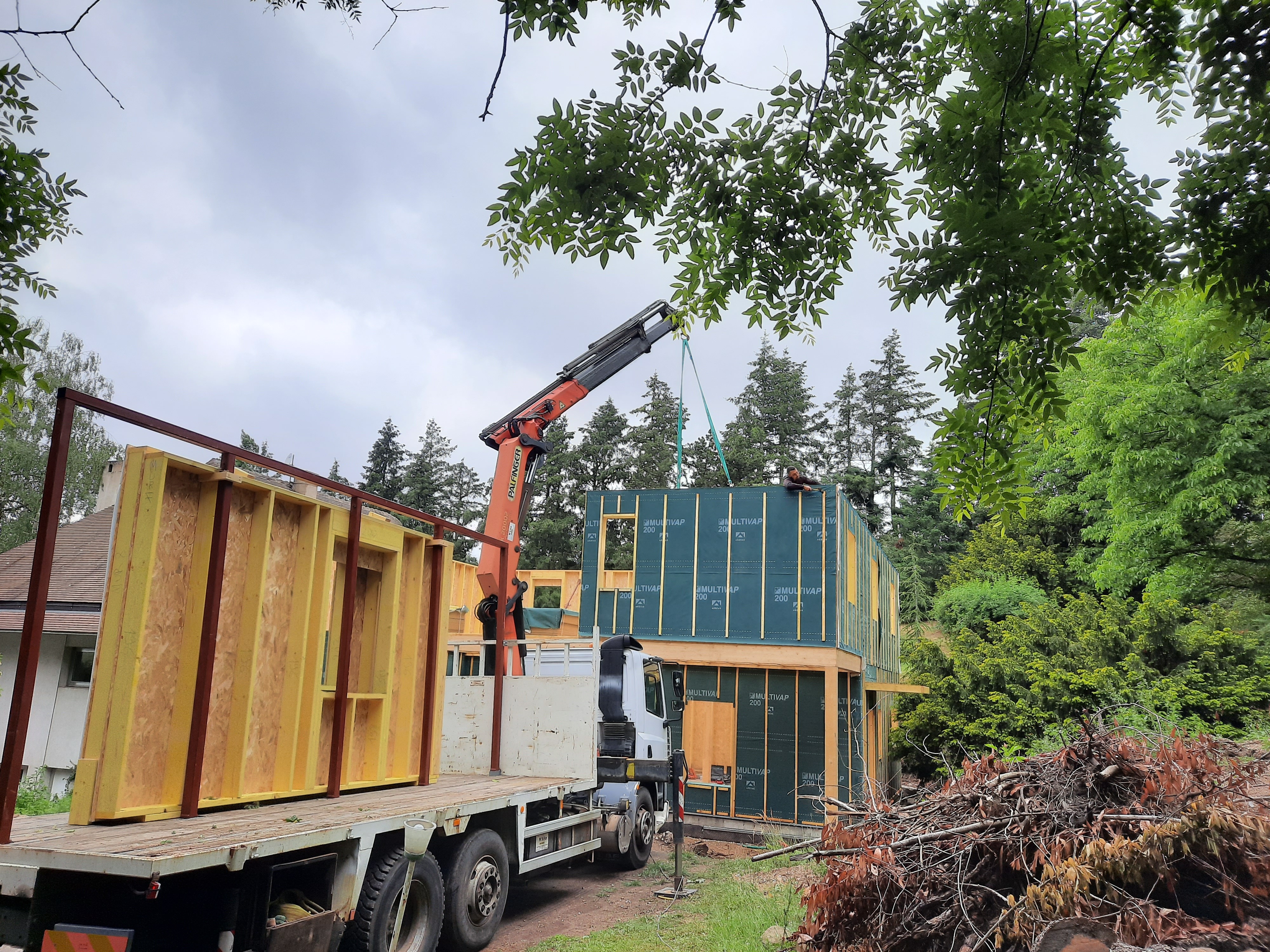 Loire Rhône Ossature bois construction Charpentier couvreur artisan Menuiseries PVC ALU Bois ossature bois extension surélévation rénovation zinguerie couverture